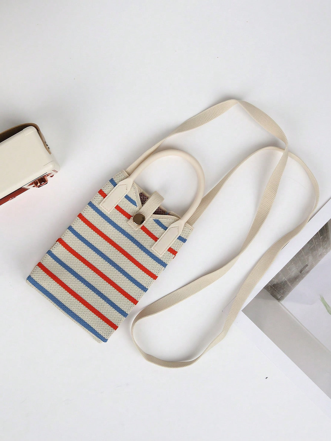 Experience the ultimate versatility with our Colorful Striped Lightweight Shoulder Bag. Perfect for all seasons, this bag features bold and trendy stripes, providing a pop of color to any outfit. The lightweight material makes it easy to carry, making it your perfect companion wherever you go.