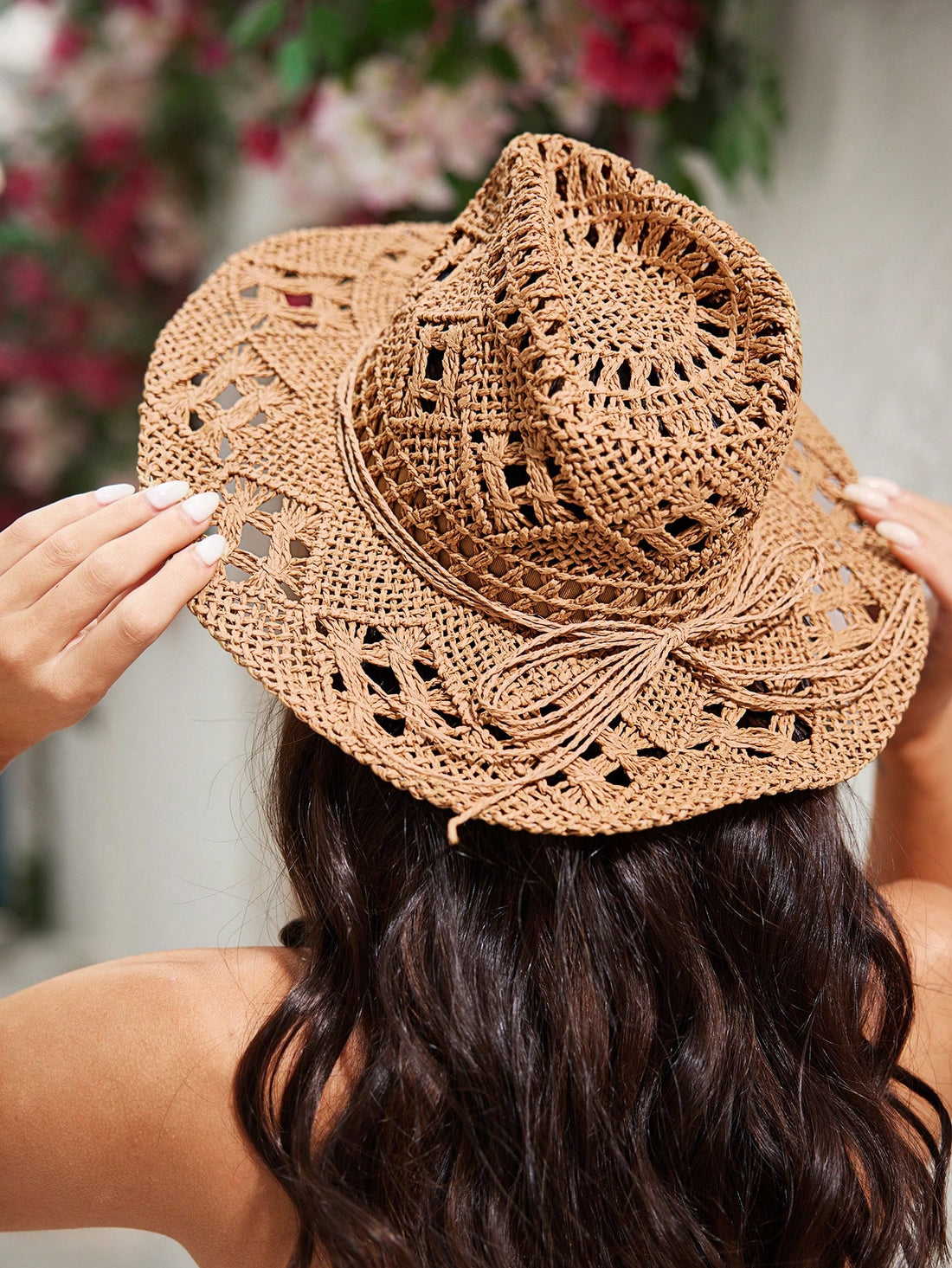 Get ready for your next picnic or beach day with the Vacation Ready: Women's Western Style Straw Cowboy Hat. Made with durable straw material, this hat provides sun protection while adding a touch of western style to your look. Stay cool and stylish under the sun.
