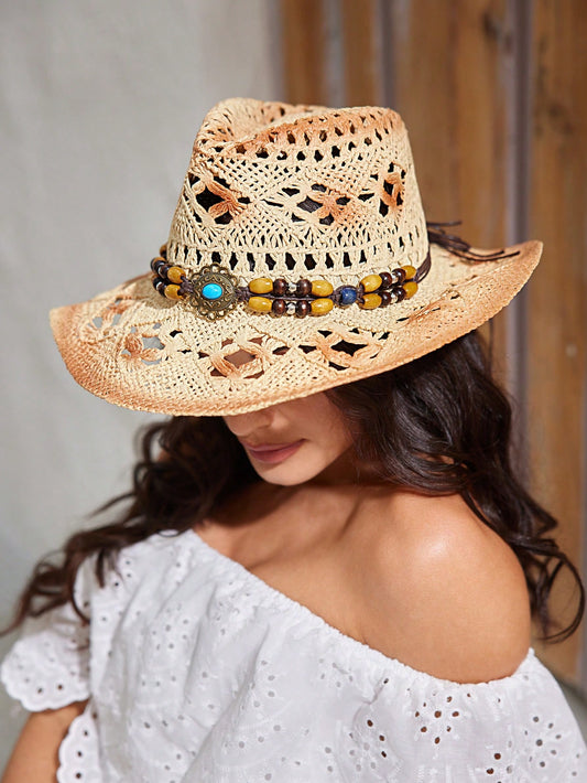 Elevate your vacation style with our Women's Western Cowboy Straw Hat. Made with high-quality straw, this hat is perfect for sunny days by the beach or exploring new cities. Its classic western design adds a touch of flair to any outfit. So stay stylish while protecting yourself from the sun's harmful rays.