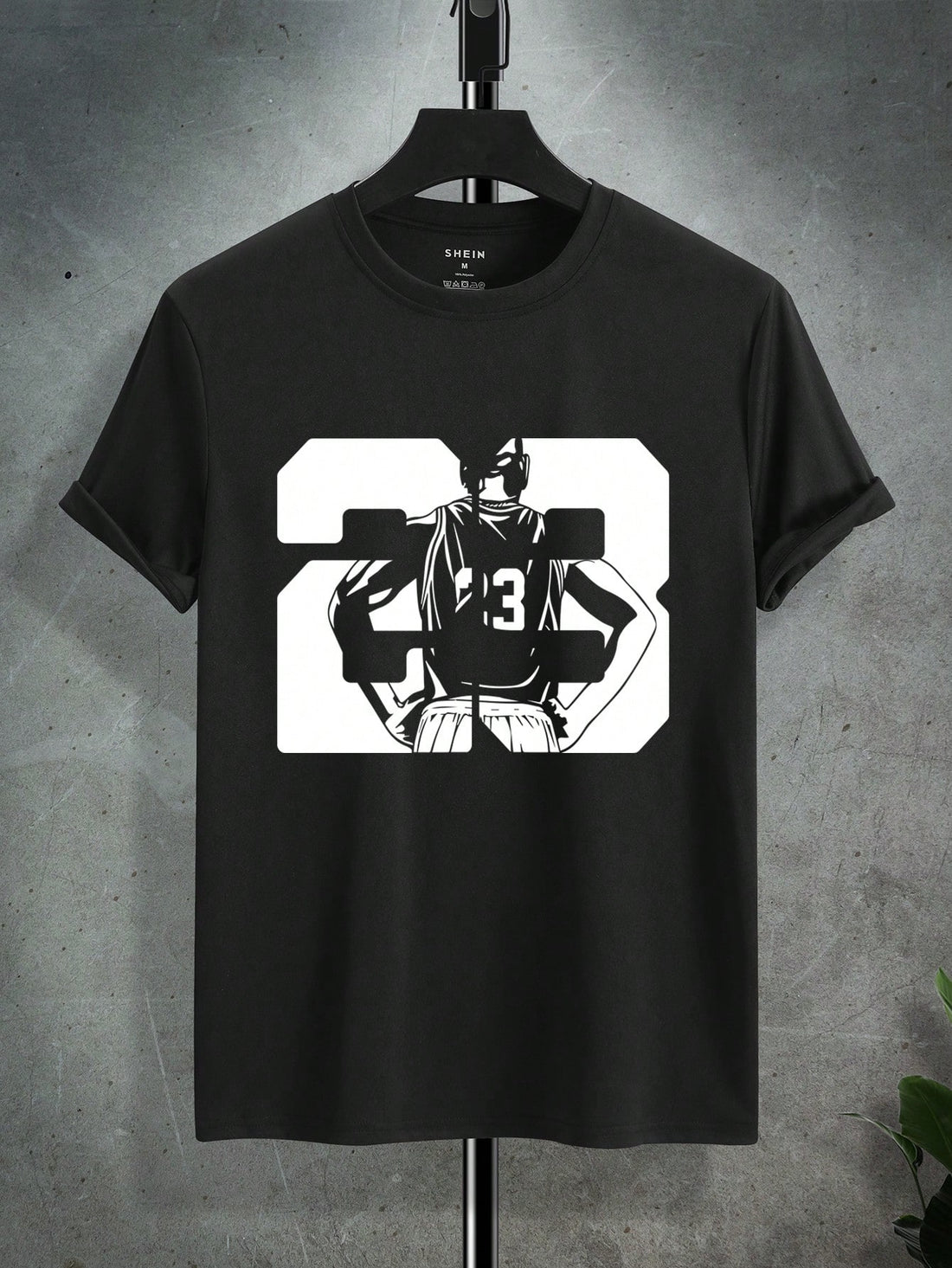 This Men's Summer Basketball Player Graphic Tee is perfect for any basketball fan or player. With its bold graphic of number 23, it's sure to turn heads. Made with a comfortable and breathable fabric, this tee will keep you cool on and off the court.