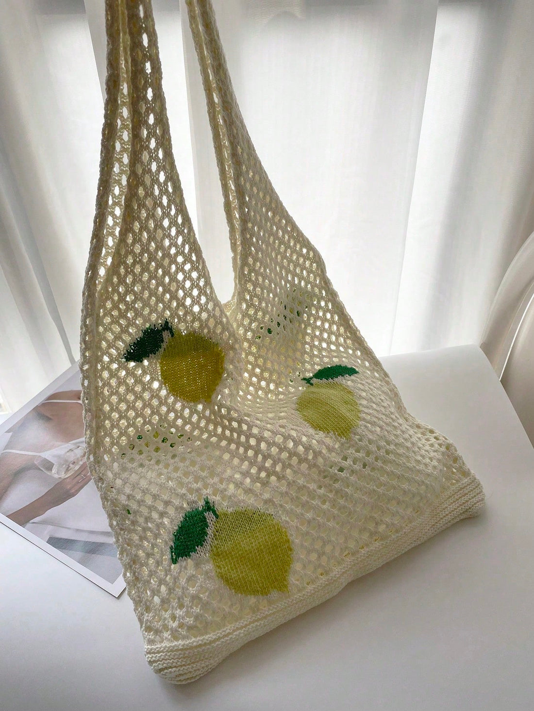 Introducing the Refreshing Lemon Beach Style Knitted Tote Bag, the perfect accessory for your next beach day. Made for women who appreciate both fashion and functionality, this tote bag is designed with a refreshing lemon print and knitted for a unique look. Its spacious interior and durable construction make it the ideal bag for carrying all your beach essentials.