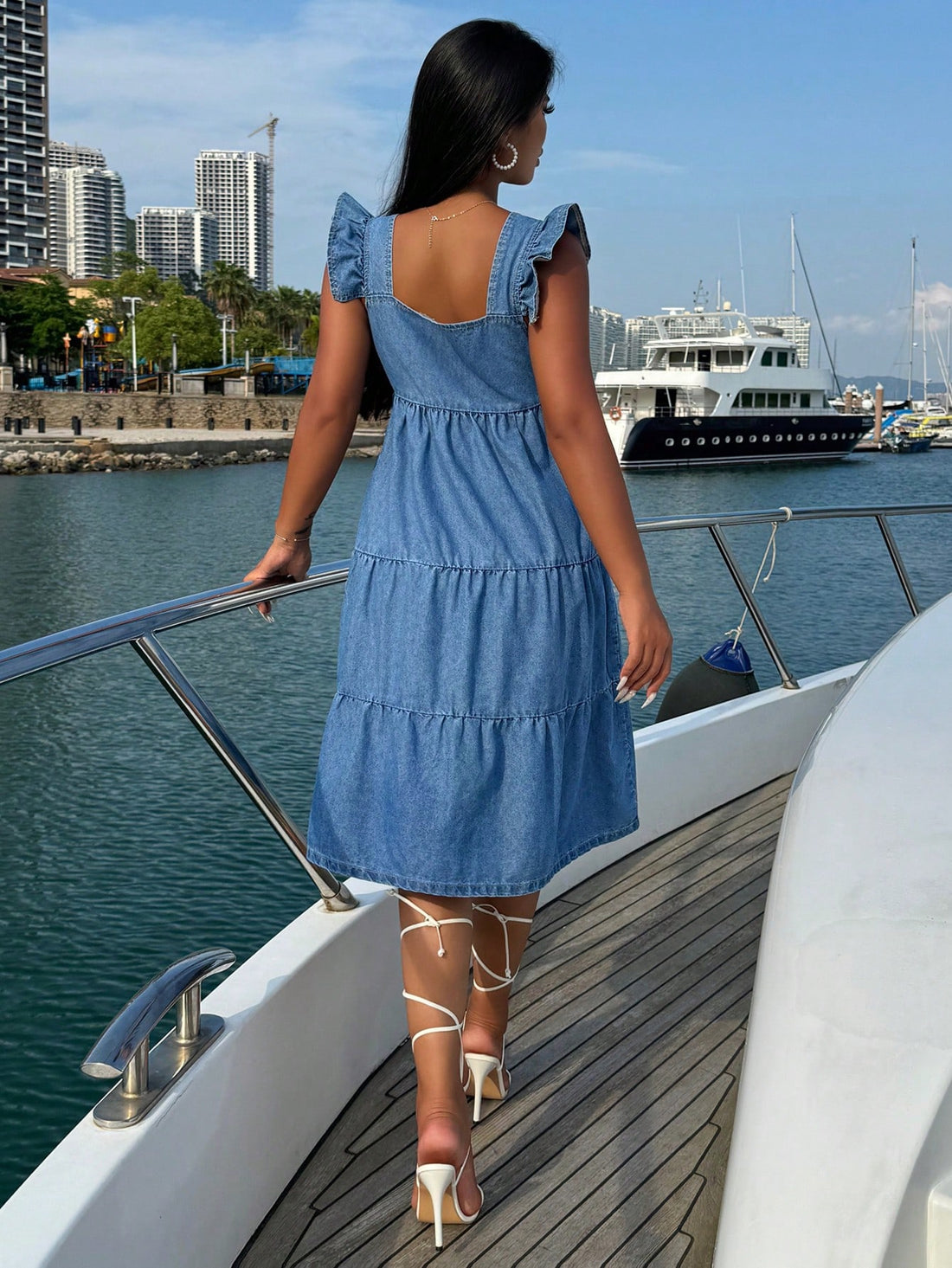 Set sail in style with our Chic Solid Color Square Collar Denim Dress! This dress features a playful ruffle hem and a unique square collar that adds a touch of quirkiness to your wardrobe. Perfect for all your cruise adventures, this dress will have you looking chic and ready for fun!