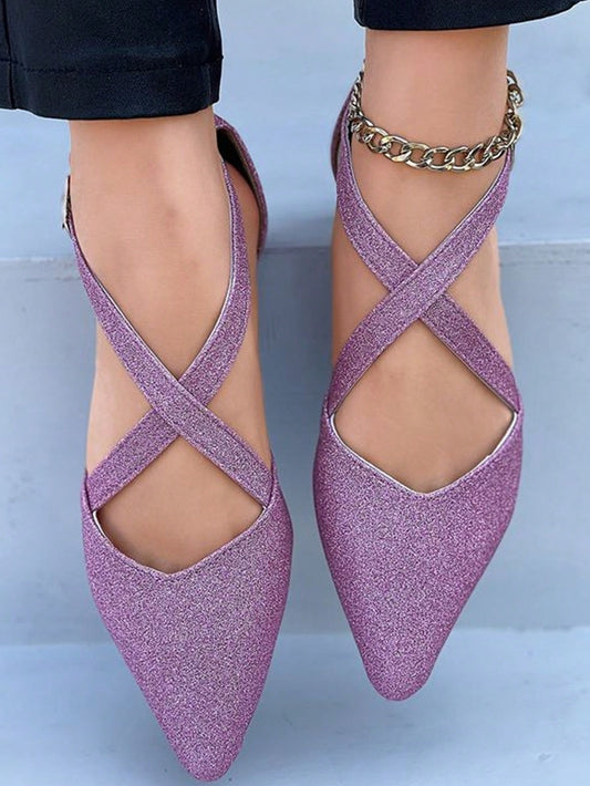 Step up your fashion game with our eye-catching Glittery Purple Pointed Toe Flats. These stylish and comfortable flats are perfect for any occasion, with a unique glittery design that adds a touch of sparkle to your outfit. The pointed toe adds a touch of elegance, while the flat sole provides all-day comfort. Upgrade your shoe collection today!