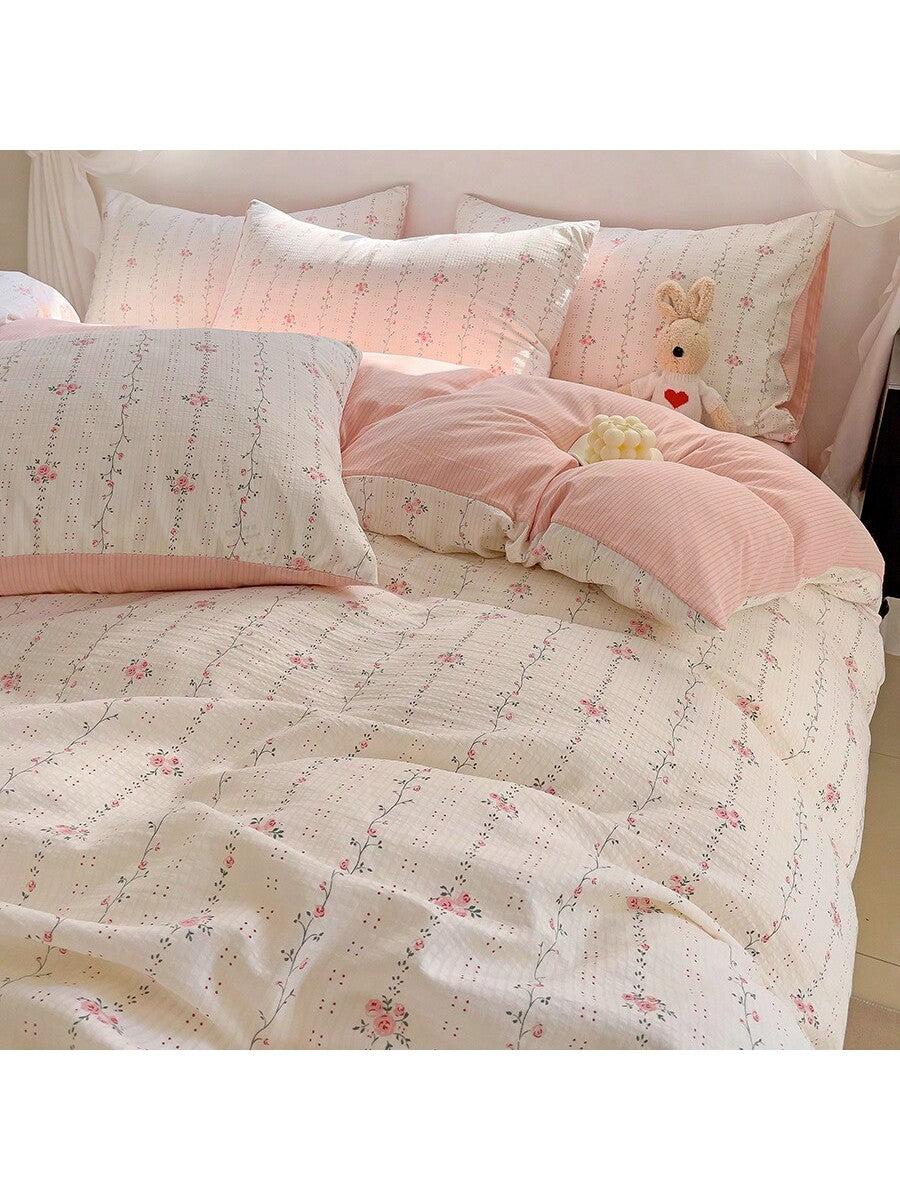Add a touch of romance to your bedroom with this Elegant 3-Piece Rose Floral Print Bedding Set. Featuring a charming rose pattern, it includes pillowcases and a duvet cover that bring a fresh, floral vibe to your space. Soft and cozy, this set invites you to snuggle up in style and enjoy sweet dreams surrounded by blooming beauty. Perfect for brightening any room with a playful yet elegant flair!
