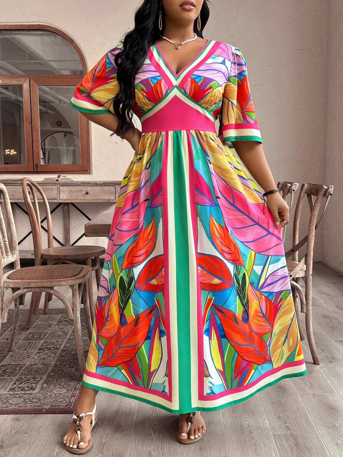 Introducing the perfect dress for your next vacation: our Effortlessly Chic high-waisted dress with a fun plant print in plus sizes. Look stylish without sacrificing comfort!