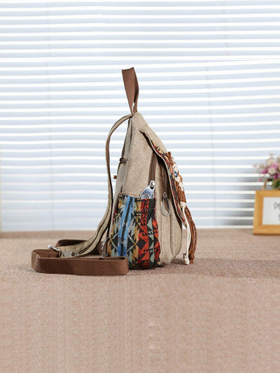 Bohemian Beauty: Vintage Embroidered Flap Backpack with Tassel Detail