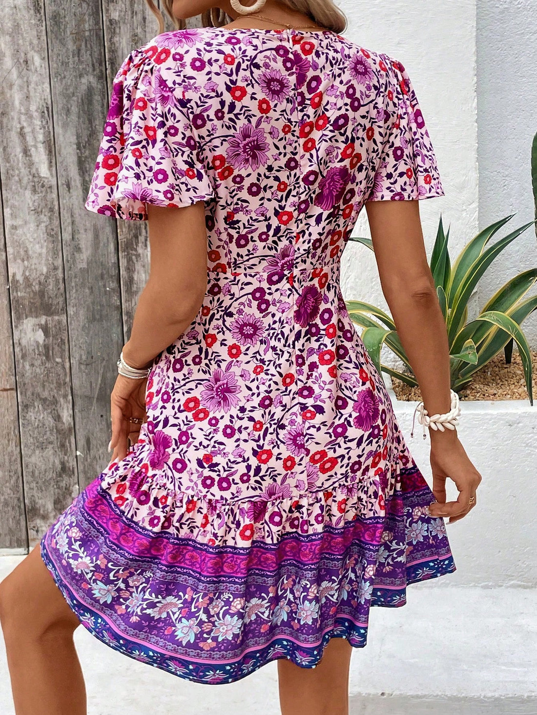 Introducing the Tropical Temptation: Women's V-Neck Full Print Cross Wrap Dress. Made with a flattering V-neck, this dress features a full print design and a wrap style for a chic and tropical look. Comfortable and stylish, this dress will be your go-to for any occasion.