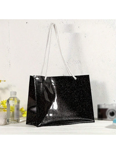 Stay stylish and organized on the go with our Clear PVC Tote Bag. Made with durable, transparent PVC material, it's perfect for those who want to show off their style while keeping their belongings in check. The spacious interior and sturdy handles make it a versatile accessory for any occasion.