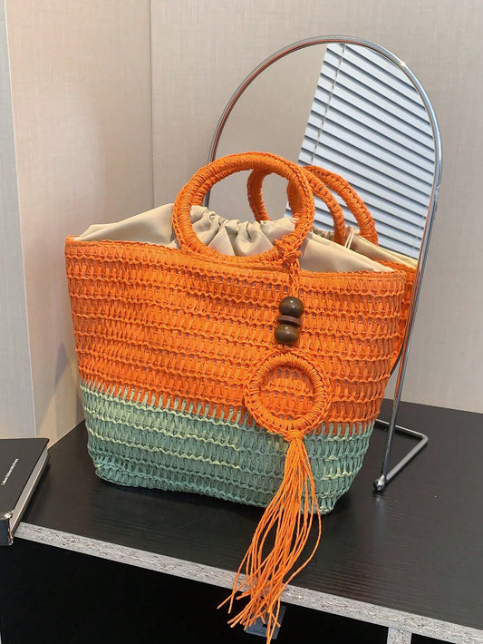 Stay stylish and organized this spring and summer with our Chic and Colorful Woven Tote Bag. Featuring a circular handle design and vibrant colors, this bag is perfect for any occasion. With ample space and a durable woven construction, it's the ultimate accessory for all your needs.