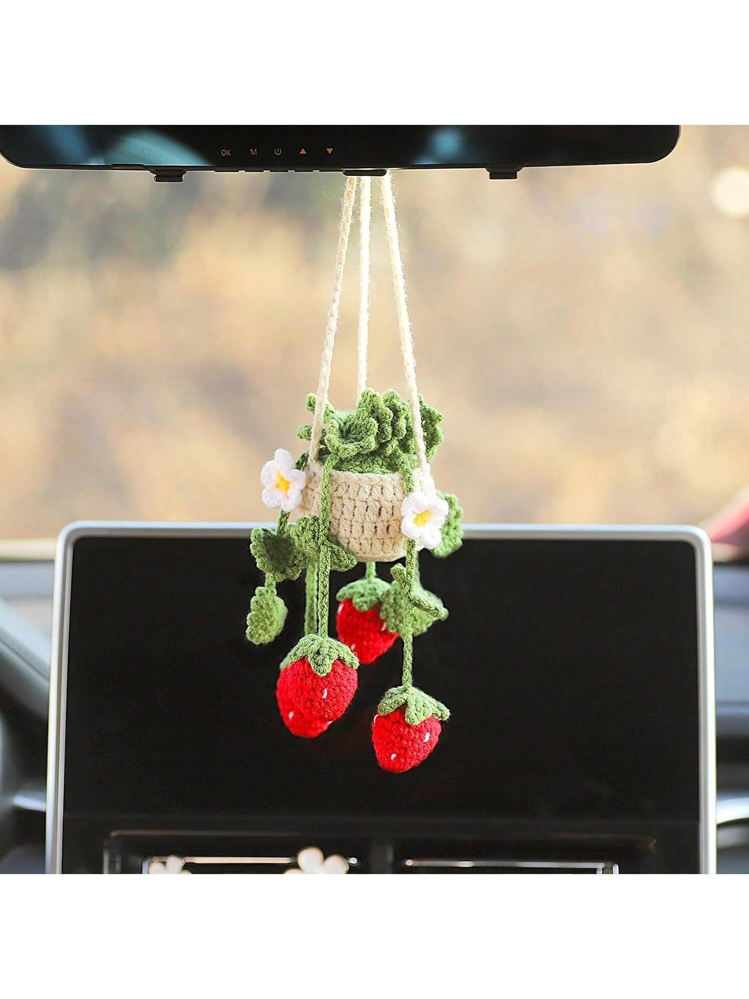 Enhance your car's interior with our Handmade Knitted White Flower Car Mirror Hanging Decoration. Made with care and attention to detail, it adds a touch of charm and personality to your vehicle. The delicate white flower design brings a calming and elegant feel to your daily commute.