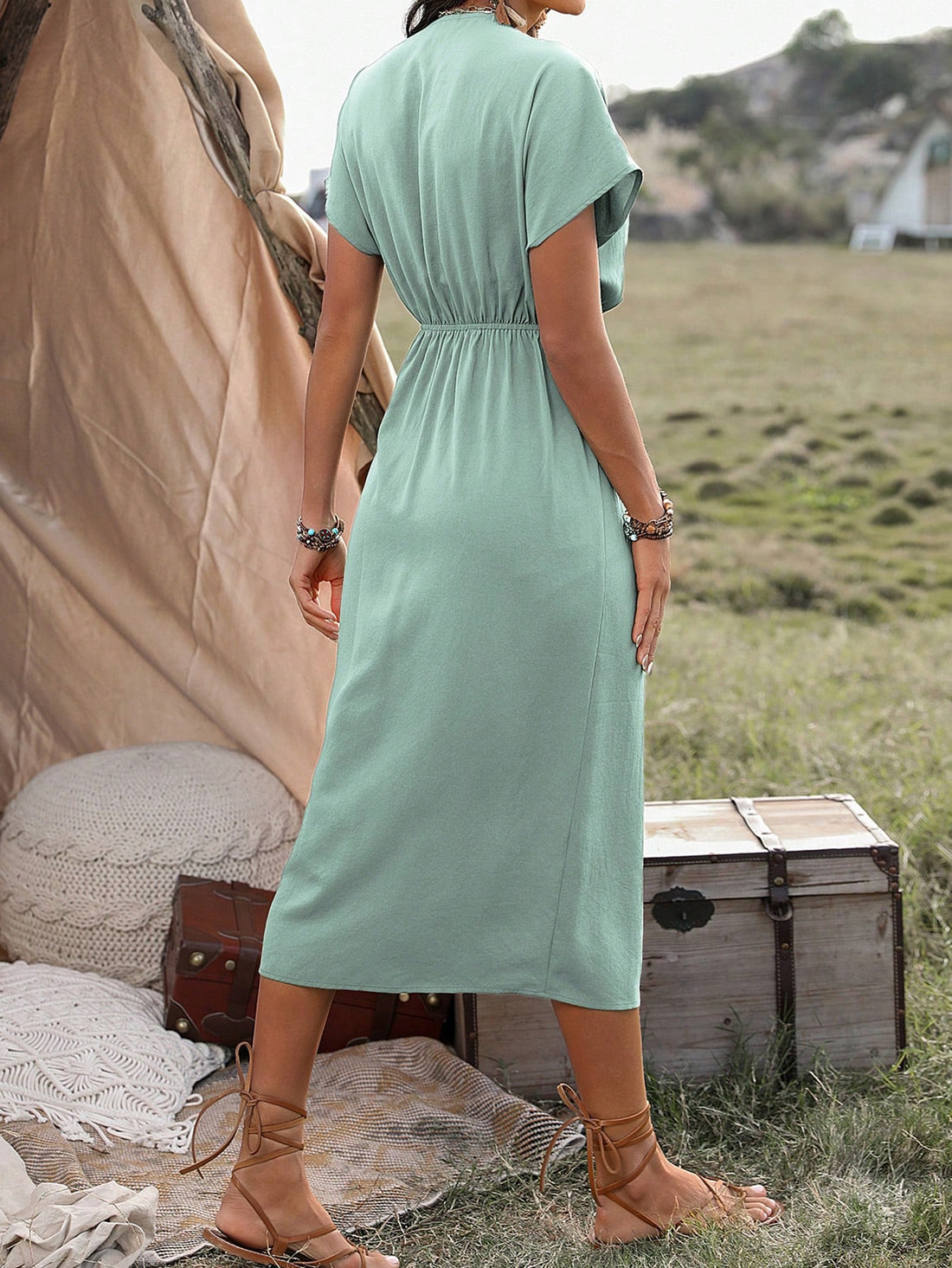 Introducing our Elegant Pleated V-Neck Dress in Mint Green, a timeless addition to your wardrobe for any occasion. The pleated design and flattering v-neckline create a sophisticated and elegant look. Crafted with high-quality materials, this dress is both stylish and comfortable. Elevate your style with this must-have piece.