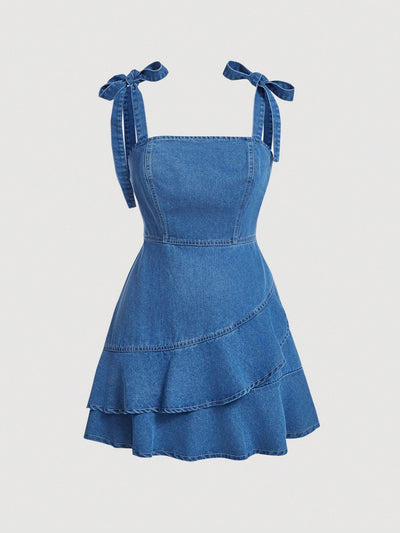 Discover the perfect summer outfit with our Ruffle Hem Denim Overall Dress! This casual and chic dress features a playful ruffle hem and versatile denim material. Stay stylish and comfortable all season long.