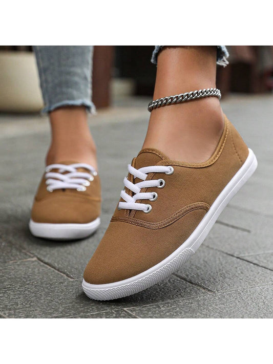 Crafted with classic white canvas, these unisex lace-up sneakers are perfect for couples seeking a casual and versatile shoe. With a comfortable fit and stylish design, these sneakers are perfect for everyday wear. Add these timeless shoes to your wardrobe today!