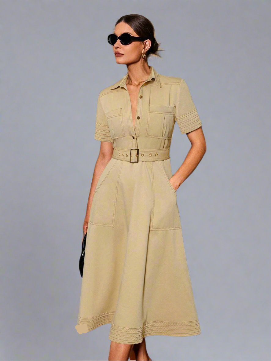 This chic color block polo dress features a belted waist for a flattering silhouette and pocket detail for added style. Look effortlessly stylish and put-together with this versatile piece. Perfect for any occasion, this dress is a must-have for any fashion-forward individual.