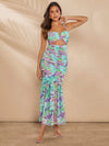 Elegant Haute Floral Ruched Mermaid Hem Dress with Chic Cutout Details