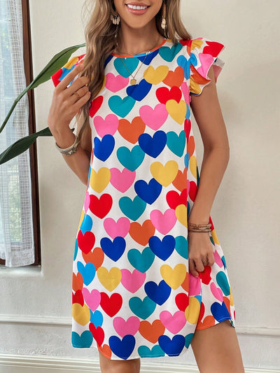 Experience the love this Mother's Day with our Essence of Love dress. This colorful heart all-over printed dress is the perfect outfit for any celebration. With its eye-catching design and comfortable fit, it's the perfect way to show your mom how much she means to you. Order now and make her day even more special.