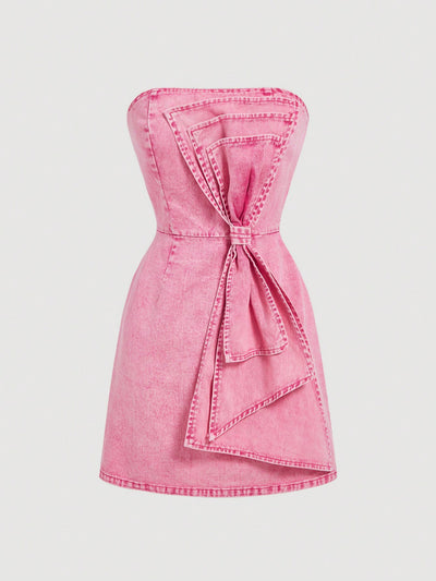 Be the epitome of sassy summer style with our Bowknot Pink Denim Mini Dress, perfect for country concerts and Mother's Day celebrations. Featuring a feminine bowknot detail, this dress offers both elegance and playfulness. Get ready to turn heads and make a statement in this must-have piece.