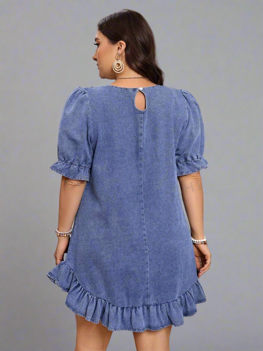 Elevate your style game with our Chic and Trendy Plus Size Denim Dress. This dress features delicate lace-trimmed puff sleeves, adding a touch of femininity to your look. Made from high-quality denim, it offers both comfort and style. Upgrade your wardrobe today with this must-have piece.