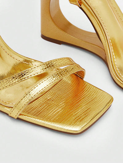 Glamorous Gold Ankle Strap Wedge Sandals: The Perfect Summer Vacation Shoes