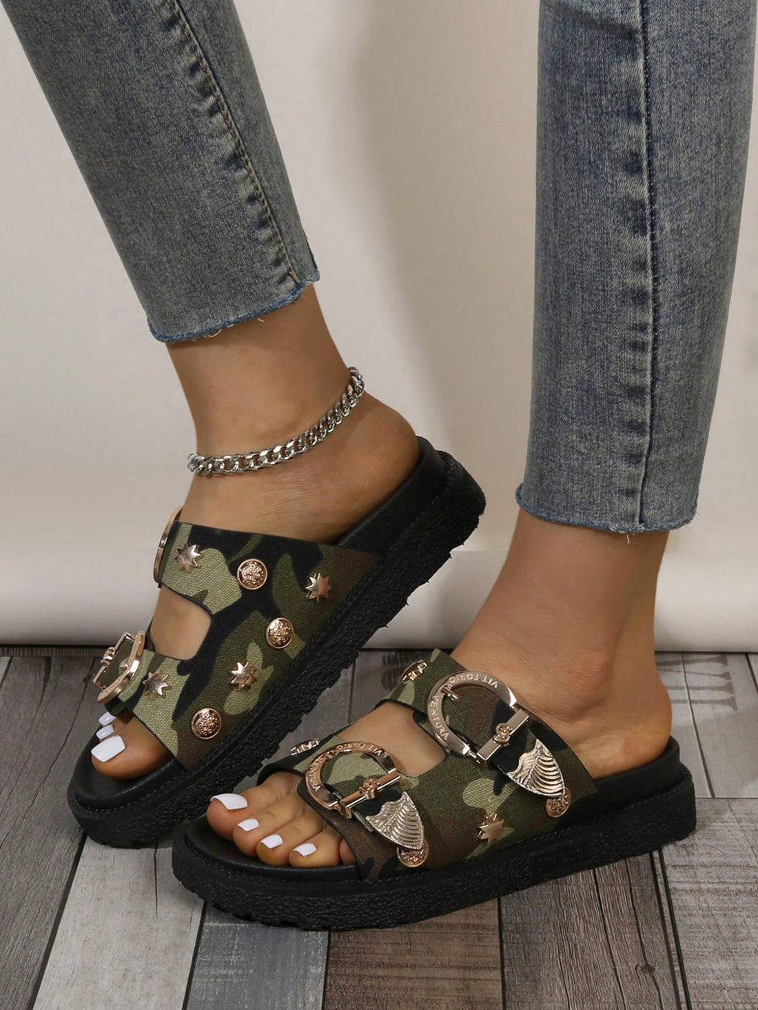 Introducing our stylish and comfortable round toe sandals, featuring a gold buckle detail and platform wedge heels for added height and style. Made with quality materials and designed for all-day wear, these sandals are perfect for any occasion. Look and feel your best with these chic and versatile sandals.