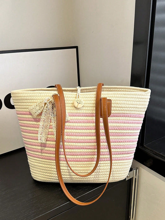 Expertly crafted with a stylish color block design, this chic woven shoulder bag is a must-have for fashionable women. Its spacious interior and sturdy straps make it the perfect accessory for everyday use. Elevate your style with this statement tote.