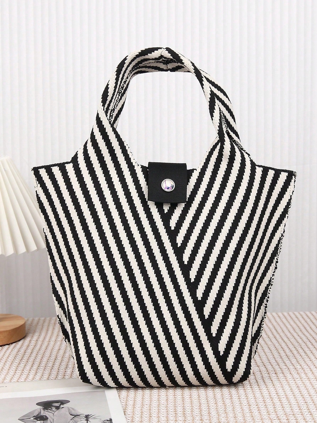 Introducing our Versatile Striped Crochet Tote Bag, the perfect companion for your everyday activities! Featuring a stylish design and sturdy construction, this bag is both fashionable and functional. With its spacious interior and durable straps, you can confidently carry all your essentials wherever you go. Upgrade your daily routine with this must-have bag!