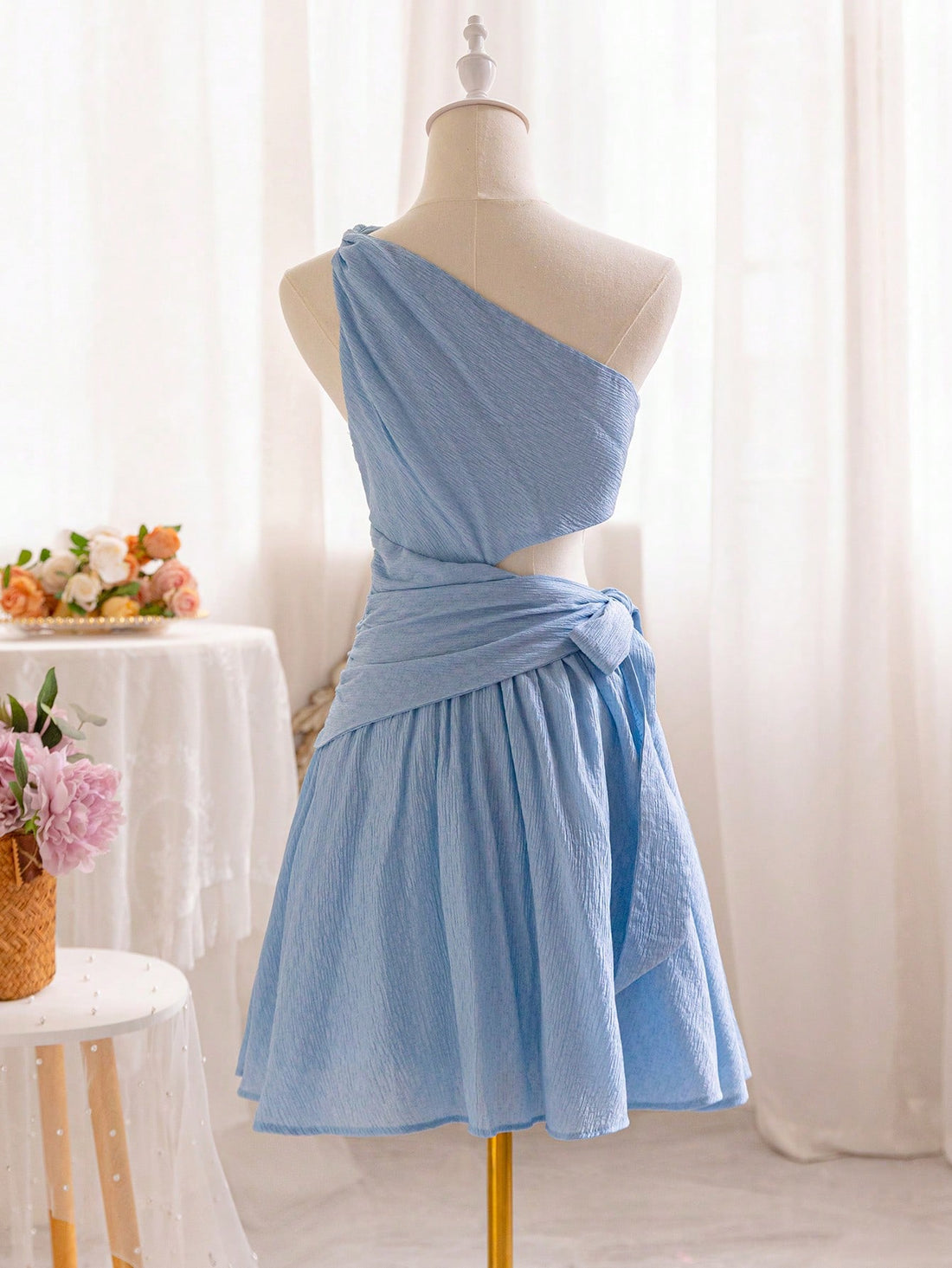 Elevate your style with our chic one-shoulder A-line dress! The elegant bow belt and stylish side slit make it perfect for graduation and summer events. Make a bold and fashionable statement with this versatile dress.