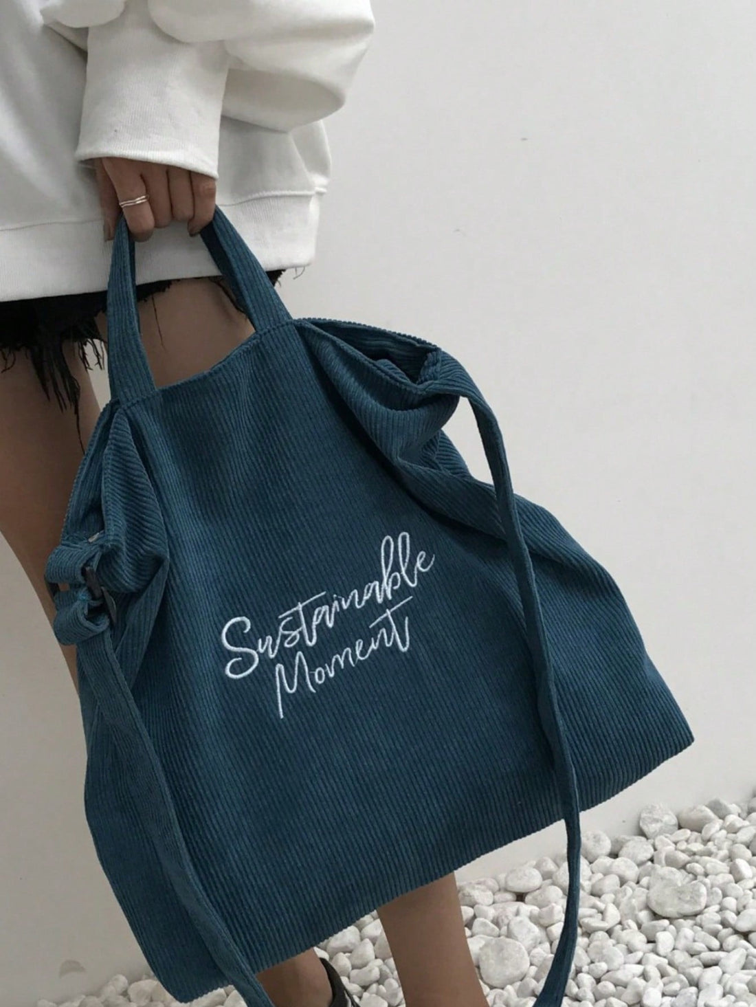 Introducing our Stylish Vintage Corduroy Shoulder Bag, the perfect addition to your fashion-forward wardrobe. Crafted with lightweight material, this trendy tote offers both style and practicality. Elevate your shopping experience with this must-have accessory.