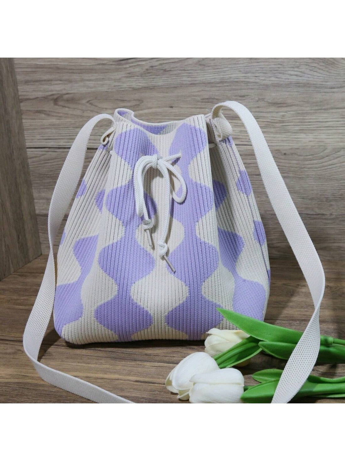 This trendy color-blocking crochet cross body bag is the perfect Mother's Day gift for mommy's essentials. With its eye-catching design and practical size, it's both stylish and functional. Keep all your essentials organized and easily accessible while on the go. Treat yourself or surprise your mom with this must-have accessory!