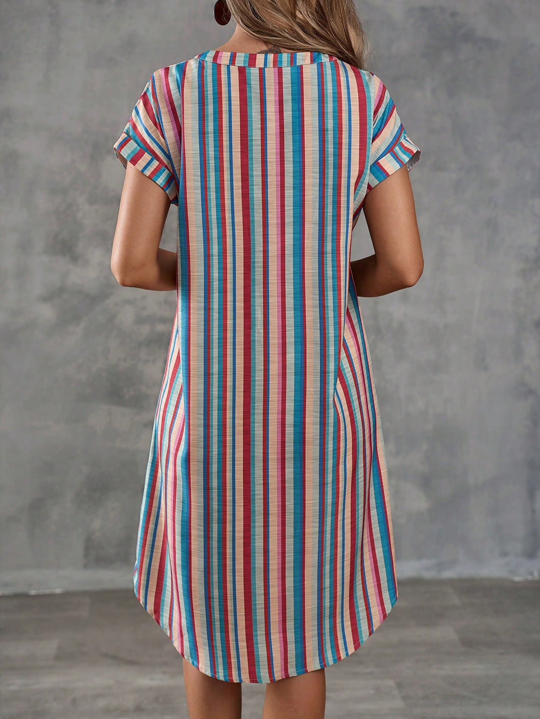 Get ready for some summer fun in our Colorful Striped Notched Neck Summer Dress! With a button front and playful, colorful stripes, this dress is perfect for casual holidays. Stay comfortable and stylish all season long in this must-have dress!