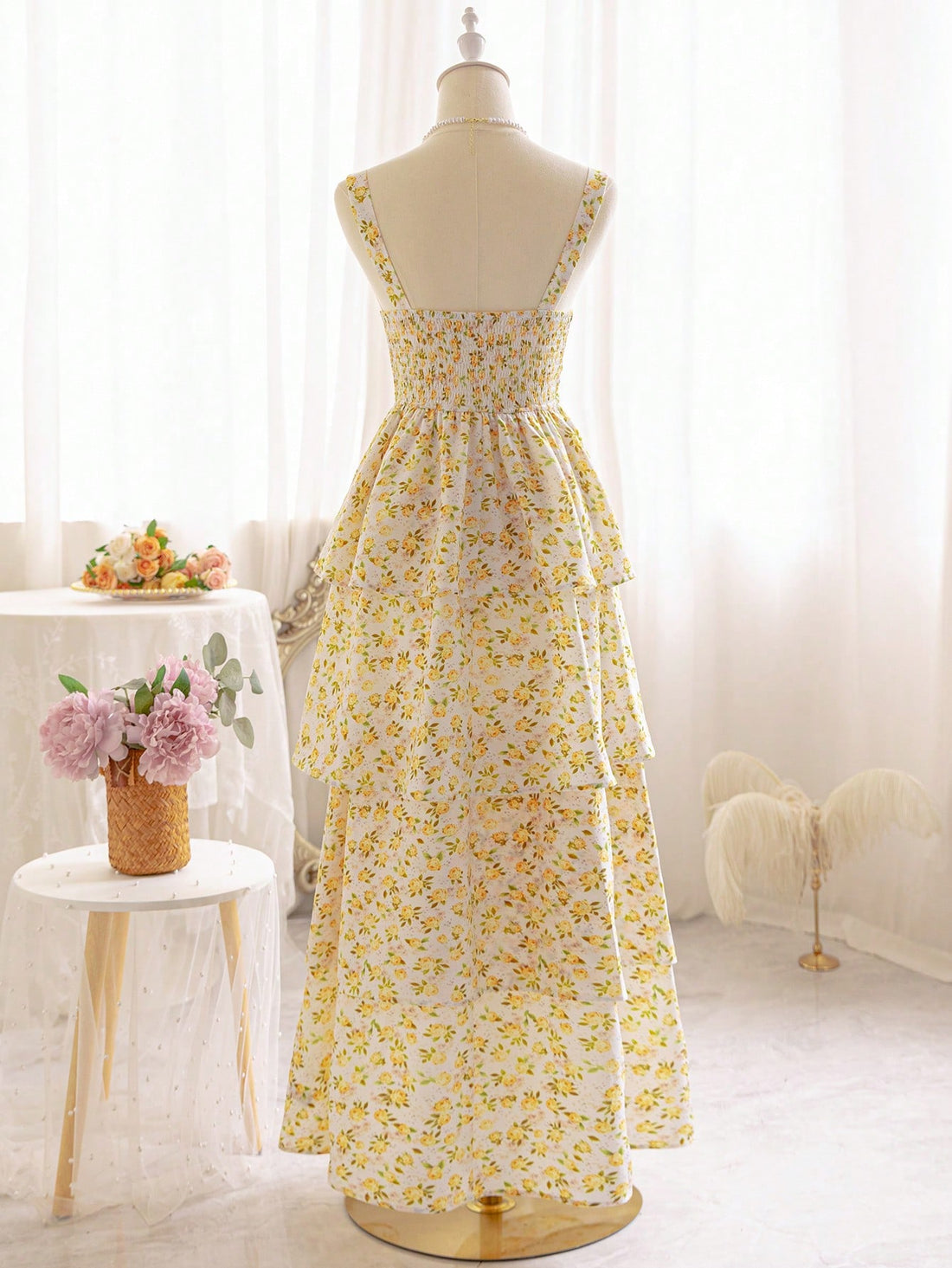 Dress to impress with this Charming Ditsy Floral Maxi Dress. Perfect for afternoon tea or wedding season, this dress effortlessly combines femininity and sophistication. Bring out your inner charm with its ditsy floral print while turning heads with its elegant maxi length. A must-have for any fashion-forward lady!