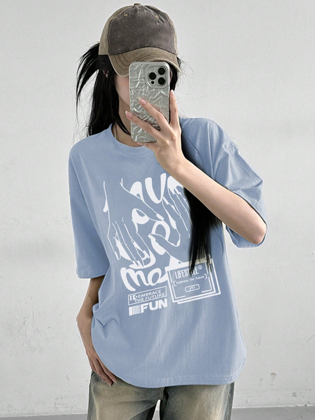 This fashionable t-shirt is designed for bold and trendy women looking to make a statement. With an eye-catching print design and an oversized street style, this shirt will surely turn heads. Made from high-quality materials, it offers both comfort and style for any casual or streetwear look.