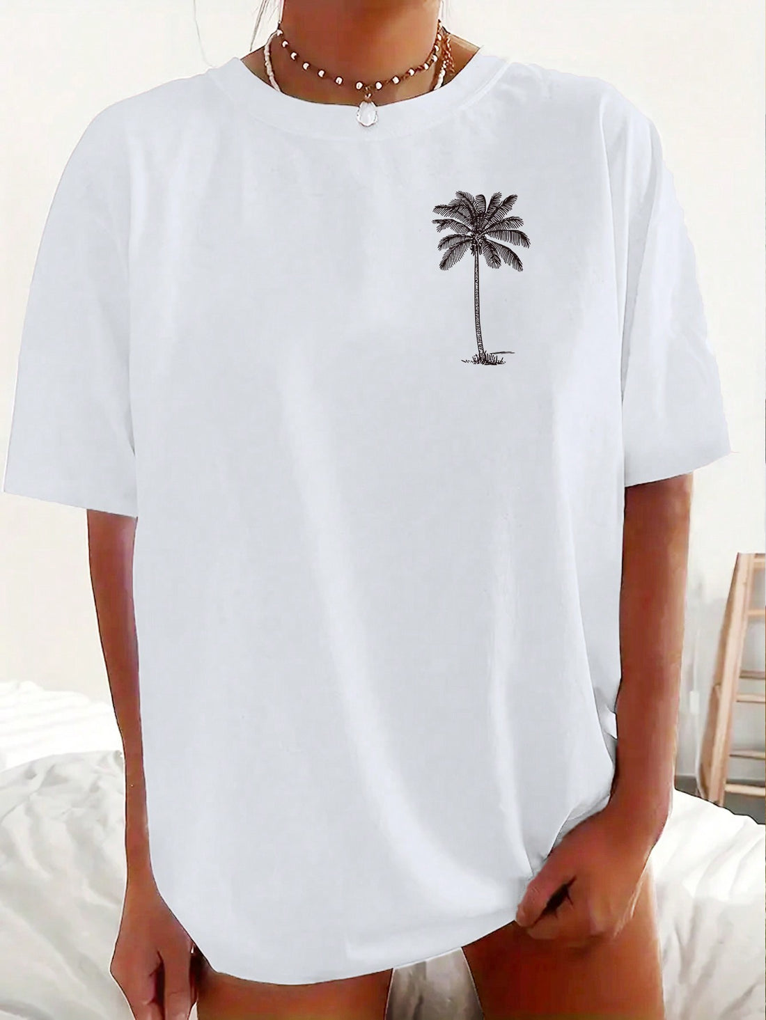 Introducing the Coconut Dreaming T-Shirt, the ultimate beach casual shirt. Made from high-quality, breathable materials, this shirt is perfect for a day spent soaking up the sun. Its relaxed fit and stylish design will have you feeling comfortable and looking great. Whether you're lounging on the sand or sipping a tropical drink, this shirt is a must-have for any beach lover.