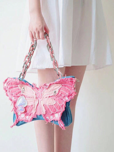 Introducing the Summer Butterfly Collection: a must-have accessory for 2024. This sweet acrylic handbag is adorned with delicate butterfly designs and features a stylish chain strap. Elevate your summer style with this trendy and unique piece.