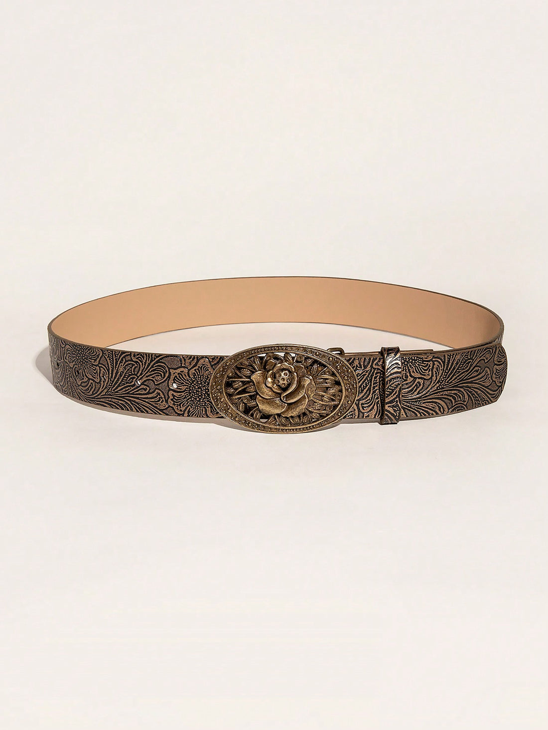 This vintage embossed western cowgirl belt features an elegant rose buckle. Made with high-quality materials, this belt adds a touch of sophistication to any outfit. The embossed design creates a unique and stylish look, while the rose buckle adds a feminine touch. Upgrade your wardrobe with this beautiful and timeless accessory.