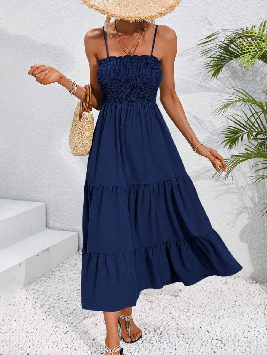 Navy smocked tiered maxi sundress with ruffle neckline