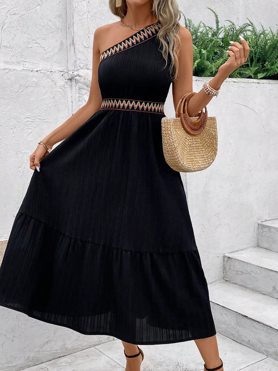 Get ready for some serious vacation vibes with our Chic Floral Trim Midi Dress! This dress features trendy shoulder cut-outs and a playful floral trim, making it the perfect choice for any beach getaway. Bring some fun and fashion to your next vacation with this must-have dress!