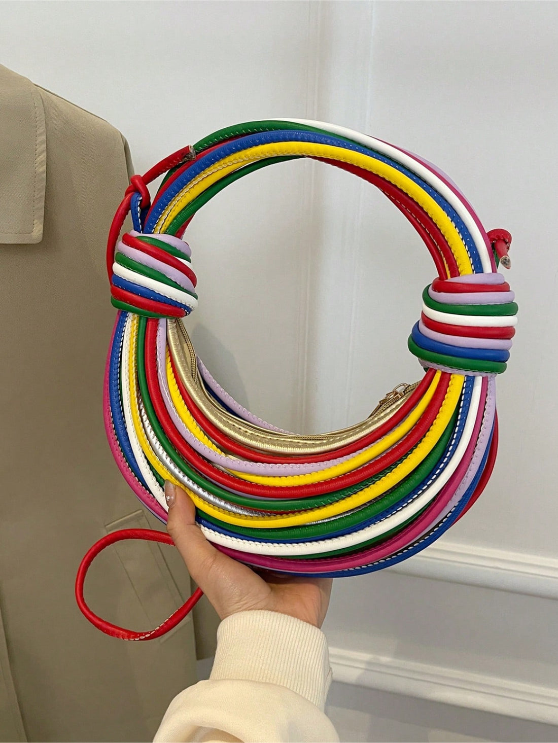 This unique handmade woven clutch bag features a random color design, perfect for adding a touch of individuality to any outfit. Its handcrafted construction ensures both quality and durability, making it a stylish and functional accessory for any occasion. Elevate your style with this one-of-a-kind clutch bag.