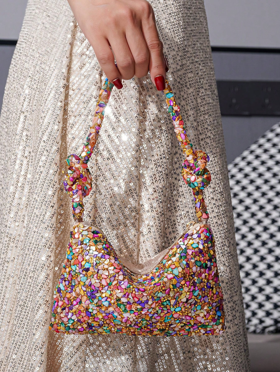 This stylish and elegant clutch is perfect for any special occasion. Its sparkling gemstone design will add a touch of glamour to any outfit. Made for women, it's the perfect accessory to carry your daily essentials while also making a statement. Add some glitter to your handbag collection with Sparkling Gemstone Glam.