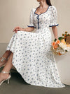 Floral Charm: Women's Sweetheart Neckline Ruffled Sleeve Dress