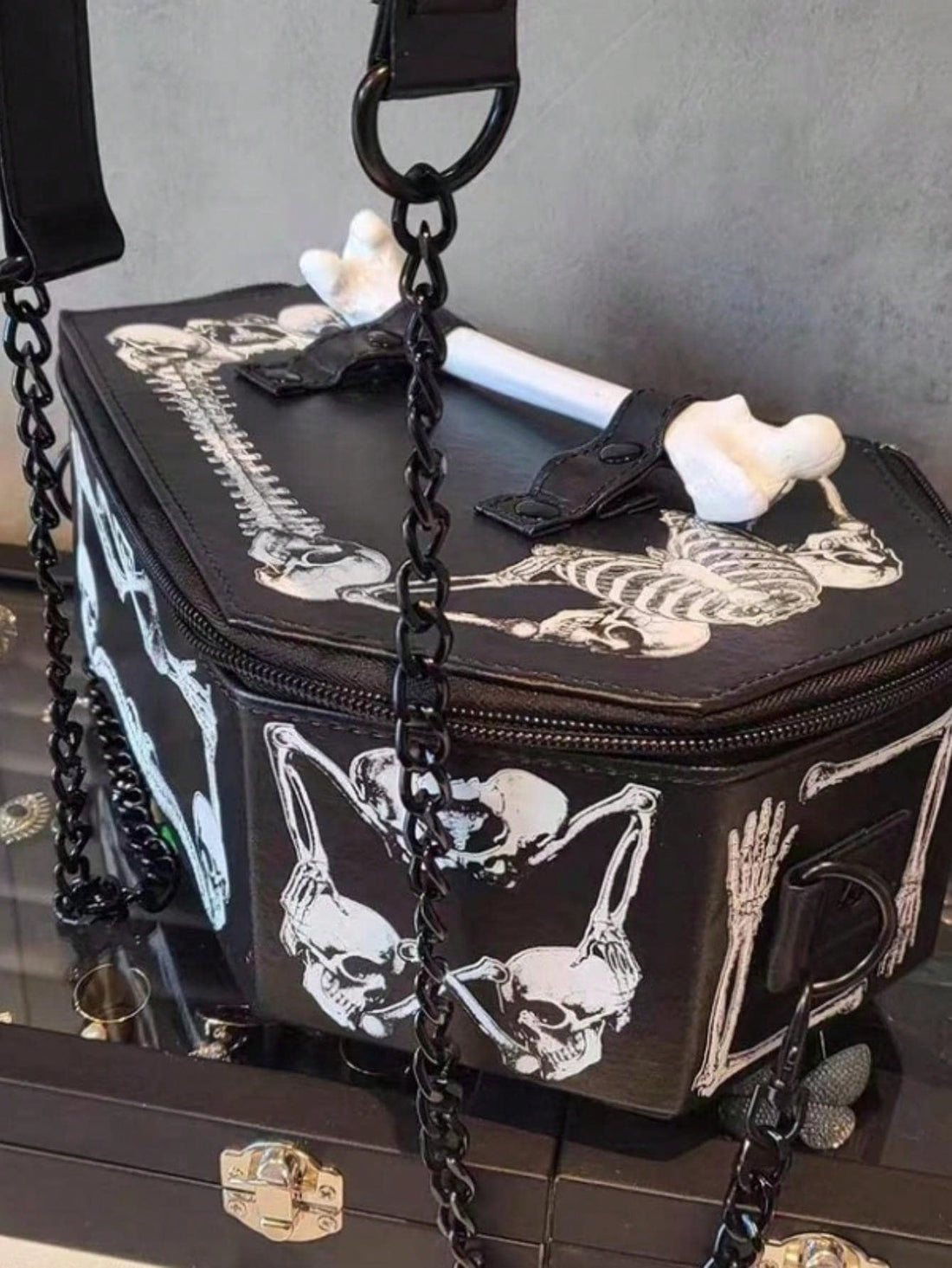 Elevate your Halloween look with our Gothic Chic Skeleton Bat Shaped Shoulder Bag. The spooky yet stylish design is perfect for the holiday, but with the high-quality construction, it's a versatile accessory for any occasion. Made with durable materials, this bag will be a go-to for years to come.