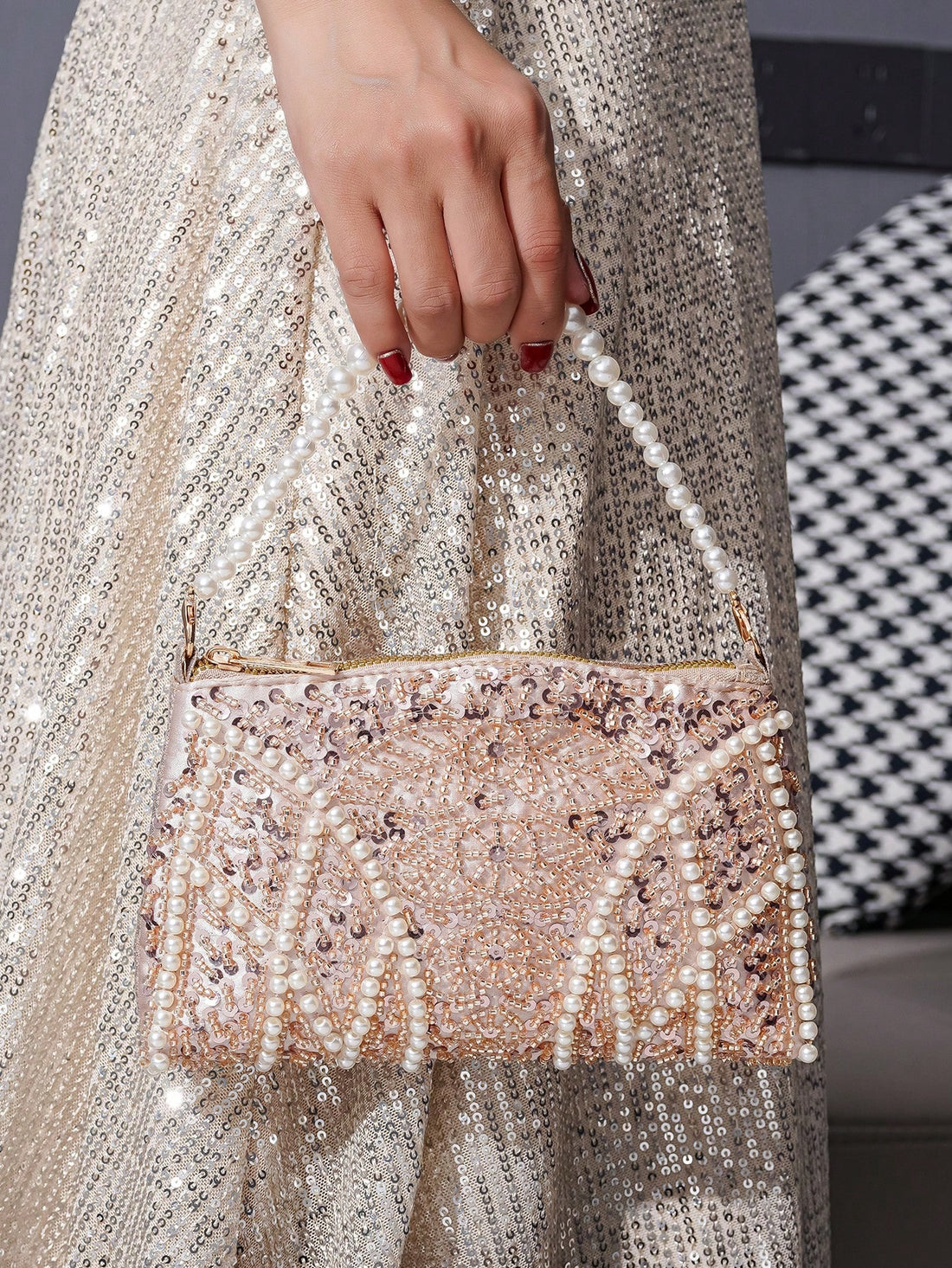 Introducing the Vincy Glitter Pearl Handbag, the perfect accessory for an elegant evening. This sparkling clutch for women features shimmering glitter and beautiful pearls, adding a touch of glamour to any outfit. Expertly crafted for a stunning and sophisticated look.