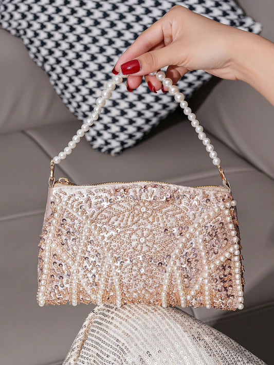 Introducing the Vincy Glitter Pearl Handbag, the perfect accessory for an elegant evening. This sparkling clutch for women features shimmering glitter and beautiful pearls, adding a touch of glamour to any outfit. Expertly crafted for a stunning and sophisticated look.