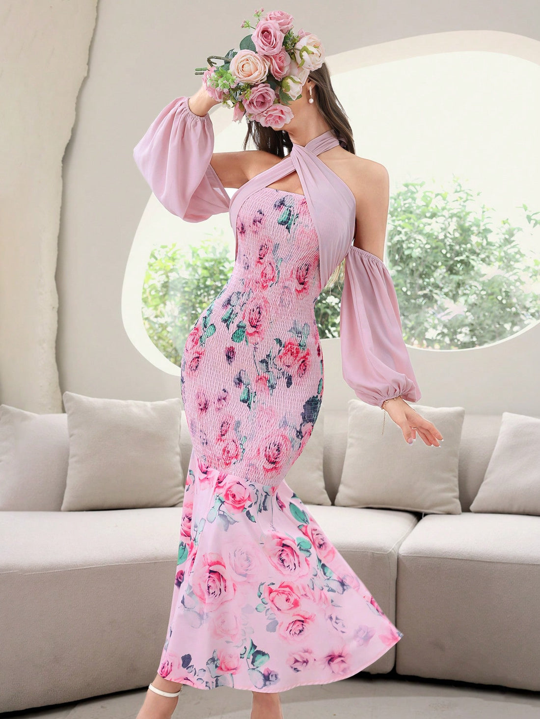 Elegant and chic, our Floral Elegance party dress is sure to make a statement. The shirred mermaid silhouette flatters all figures, while the floral design adds a touch of femininity. Perfect for any special occasion, this dress is a must-have in any fashion-savvy woman's wardrobe.