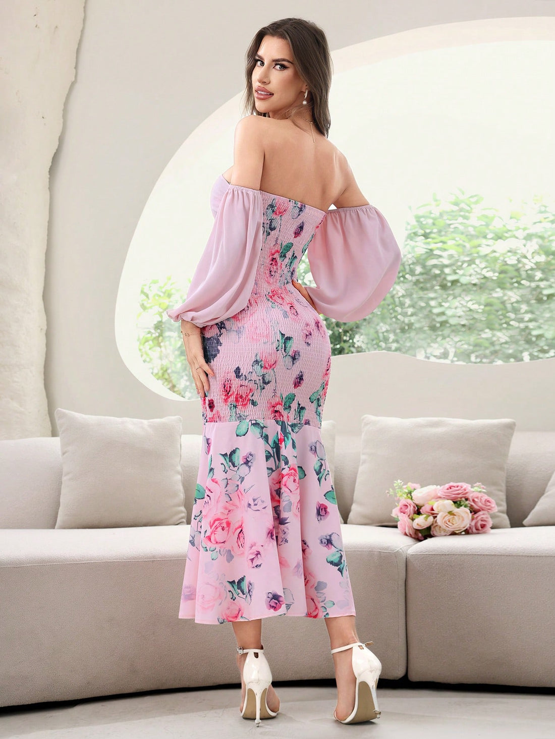 Elegant and chic, our Floral Elegance party dress is sure to make a statement. The shirred mermaid silhouette flatters all figures, while the floral design adds a touch of femininity. Perfect for any special occasion, this dress is a must-have in any fashion-savvy woman's wardrobe.
