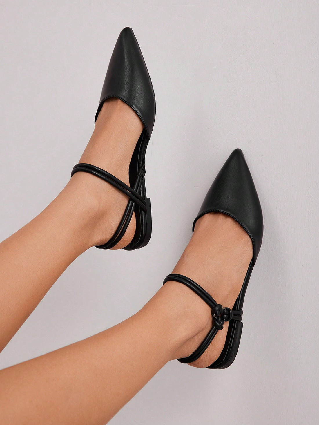 Elevate your professional style with Elegant Basics Ankle Strap Pointed Toe Flat Shoes. Designed for business chic women, these elegant flats feature a pointed toe and ankle strap for a sophisticated look. Perfect for the office or a formal event, these shoes offer both fashion and comfort.