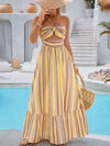 This Summertime Dream dress offers a sleeveless design perfect for staying cool and comfortable in the heat. Its striped floral print and unique neck hanging design make it a stylish option for any vacation. Made from lightweight fabric, it's a great choice for relaxing or exploring during your travels.