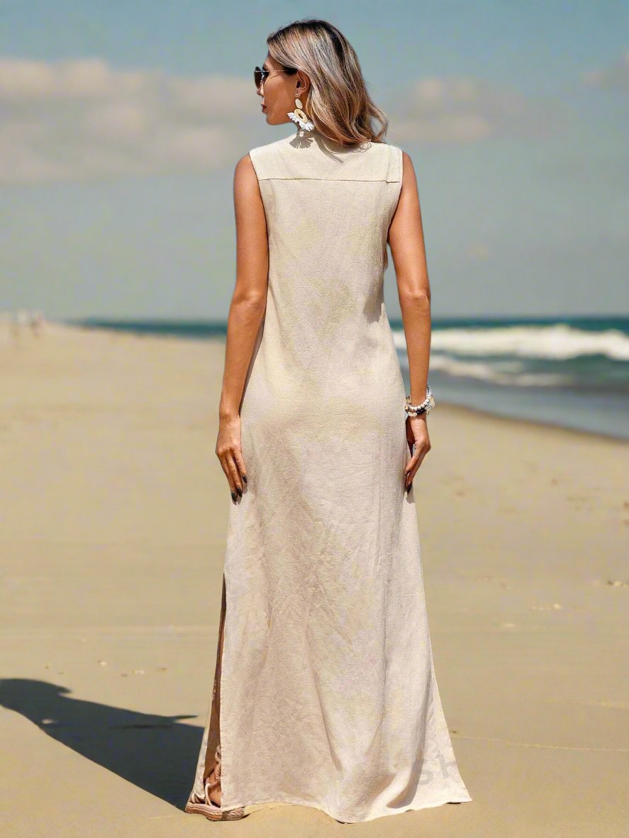 Indulge in the perfect summer dress with our Glamorous Getaway V-Neck Casual Dress. Made for fashion-forward women, this dress features a flattering V-neck and alluring thigh-high slits, making it perfect for any summer getaway. Stay comfortable and look effortlessly chic in this must-have dress.