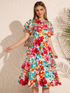 Fluttering Floral Beauty: Butterfly Sleeve Layered Hem Floral Dress