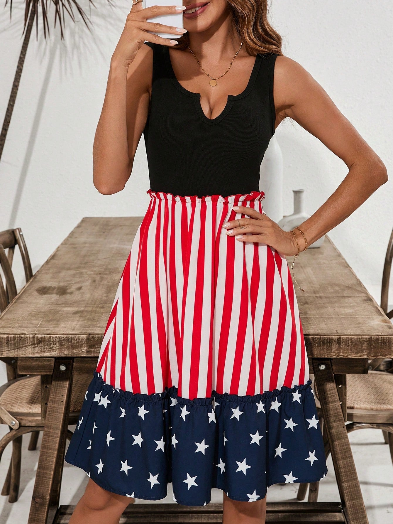 Celebrate Independence Day in style with our Clasi Patchwork Flag Print Dress. Made with ruffled pleats and a unique patchwork design, this dress is perfect for a chic and patriotic look. Show off your love for your country in this trendy and comfortable dress.